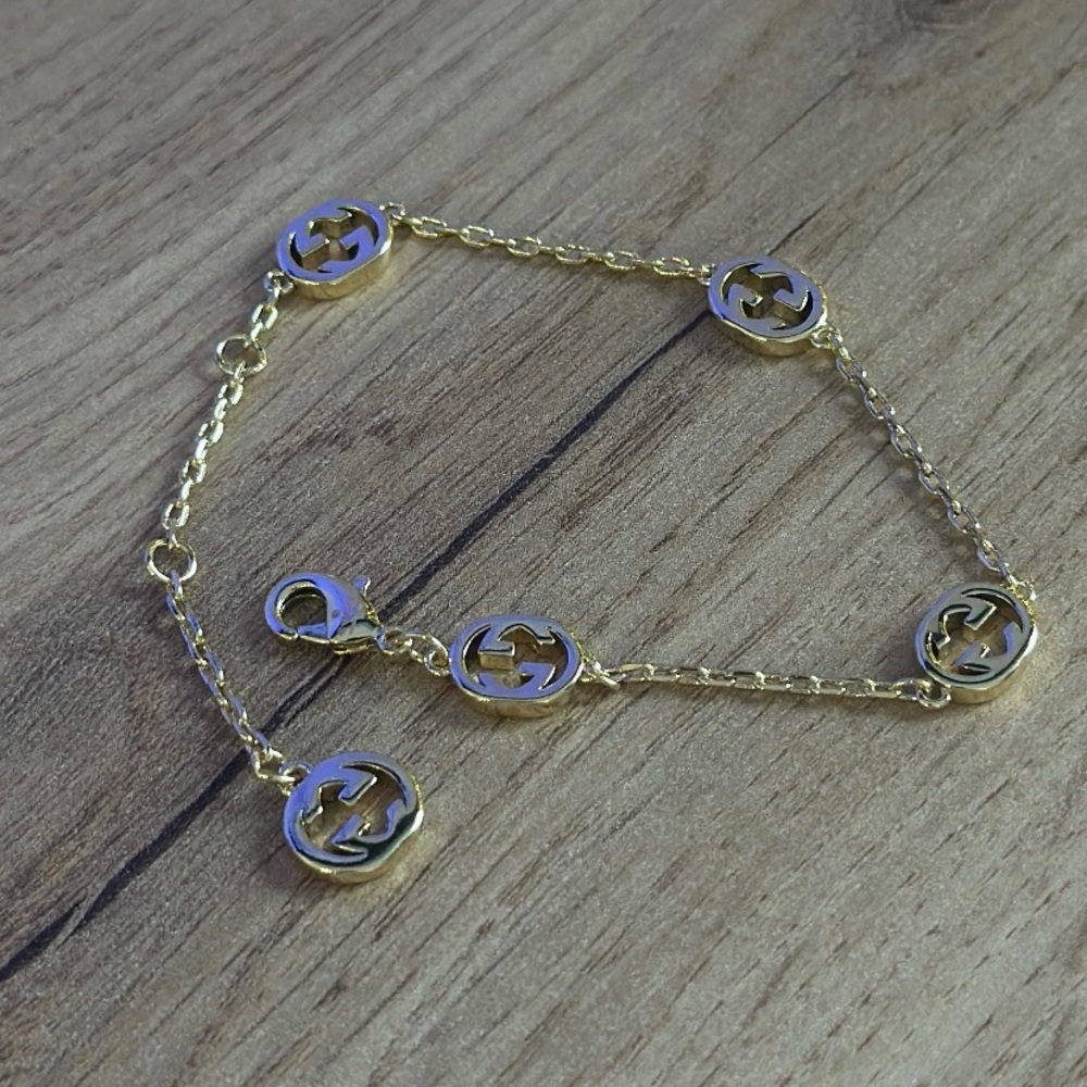 Sold Vintage Gucci VTG GG Gold Chain Bracelet Charm Golden GG Monogram Luxury